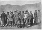 Группа снятая во время пребыванія на Памирском посту. Третья фигура слѣва татаринъ Куль Маметыевъ, участвовавшій в первом восхождении на Мустагъ-ату
